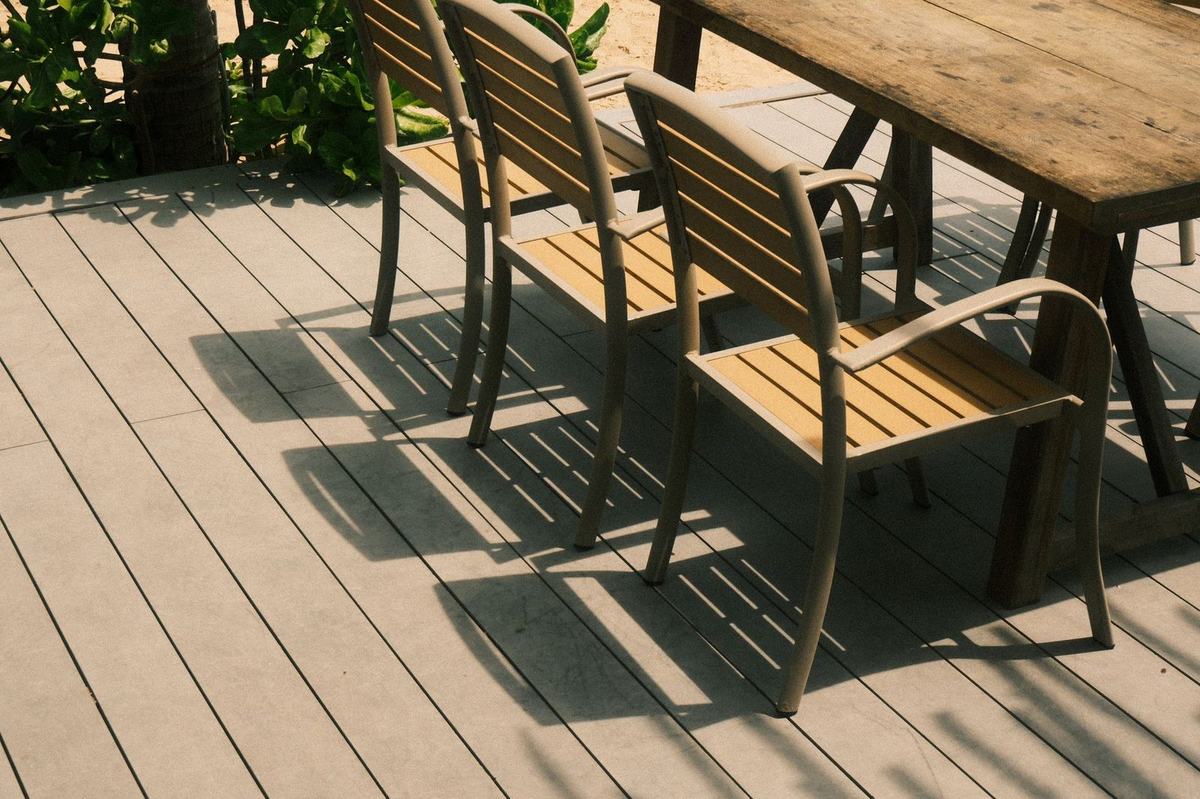 Composite deck with outdoor dining furniture